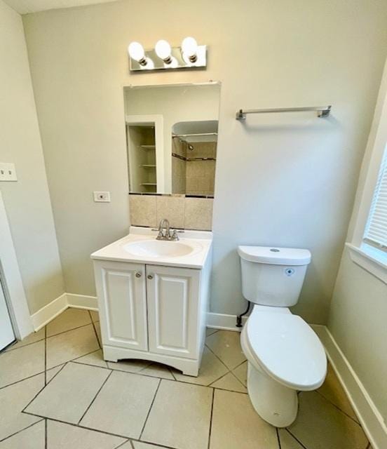 132 W 126th Pl, Chicago, IL 60628 - bathroom with vanity, tile patterned flooring, and decorative backsplash