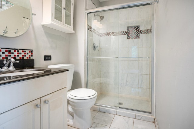 321 Woodbury Ct Unit D2, Schaumburg, IL 60193 - bathroom featuring marble finish floors, a shower stall, and vanity