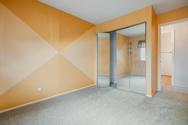 321 Woodbury Ct Unit D2, Schaumburg, IL 60193 - unfurnished bedroom featuring carpet and a closet