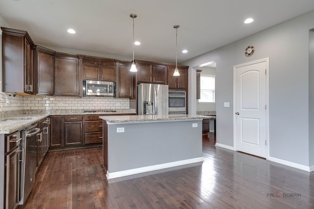 621 Blazing Star Dr, Lake Villa, IL 60046 - kitchen featuring stainless steel appliances, backsplash, dark brown cabinets, and recessed lighting