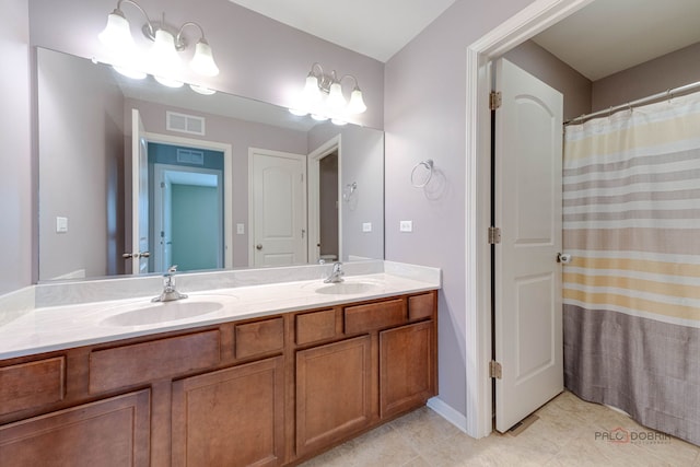 621 Blazing Star Dr, Lake Villa, IL 60046 - bathroom with double vanity and tile patterned floors