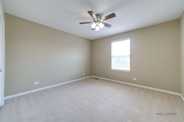 621 Blazing Star Dr, Lake Villa, IL 60046 - spare room with a ceiling fan and light carpet