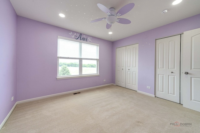 621 Blazing Star Dr, Lake Villa, IL 60046 - unfurnished bedroom featuring multiple closets, carpet flooring, recessed lighting, and ceiling fan