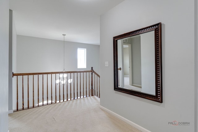 621 Blazing Star Dr, Lake Villa, IL 60046 - corridor with a chandelier and carpet