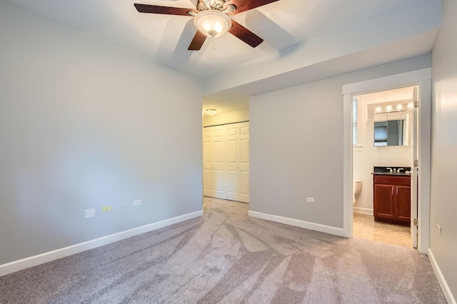 4056 N Albany Ave Unit G, Chicago, IL 60618 - unfurnished bedroom featuring light carpet, ensuite bath, a ceiling fan, and a closet