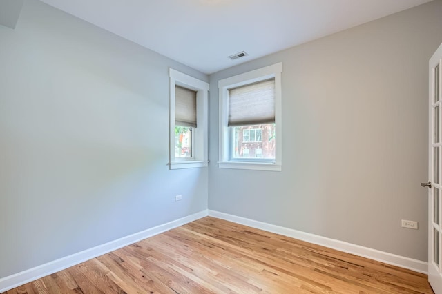 4056 N Albany Ave Unit G, Chicago, IL 60618 - spare room with baseboards and light wood-type flooring