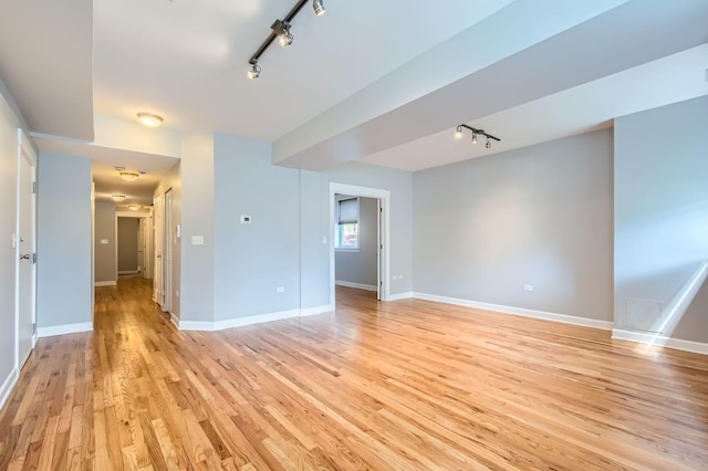 4056 N Albany Ave Unit G, Chicago, IL 60618 - unfurnished room featuring track lighting and light wood finished floors