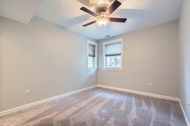 4056 N Albany Ave Unit G, Chicago, IL 60618 - empty room with ceiling fan and dark carpet