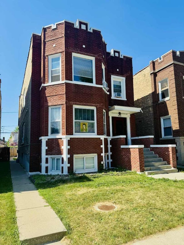 5221 W Montrose Ave, Chicago, IL 60641 - view of front of house with brick siding and a front yard