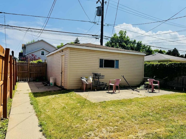 5221 W Montrose Ave, Chicago, IL 60641 - back of property with a fenced backyard and a patio
