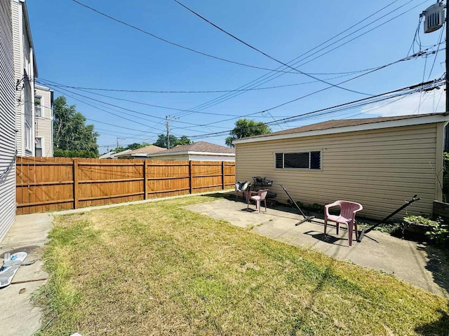 5221 W Montrose Ave, Chicago, IL 60641 - view of yard featuring a patio