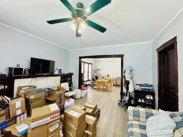 5221 W Montrose Ave, Chicago, IL 60641 - living area featuring wood finished floors, a ceiling fan, and crown molding