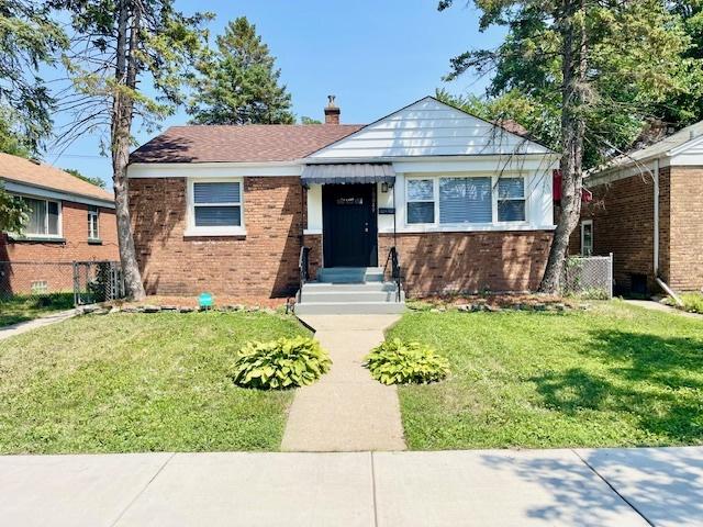 10049 S Calhoun Ave, Chicago, IL 60617 - bungalow-style home featuring brick siding, a chimney, and entry steps