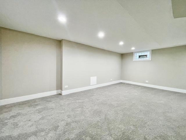 10049 S Calhoun Ave, Chicago, IL 60617 - below grade area with carpet floors and recessed lighting