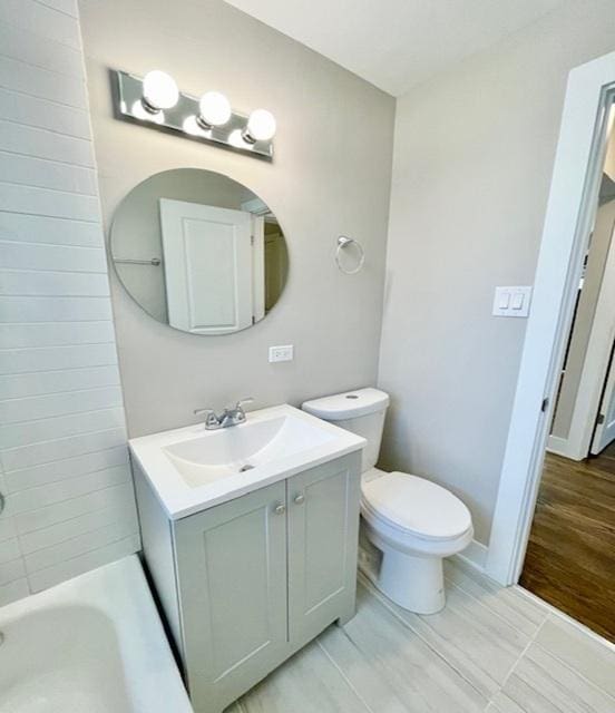 10049 S Calhoun Ave, Chicago, IL 60617 - bathroom featuring vanity and wood finished floors