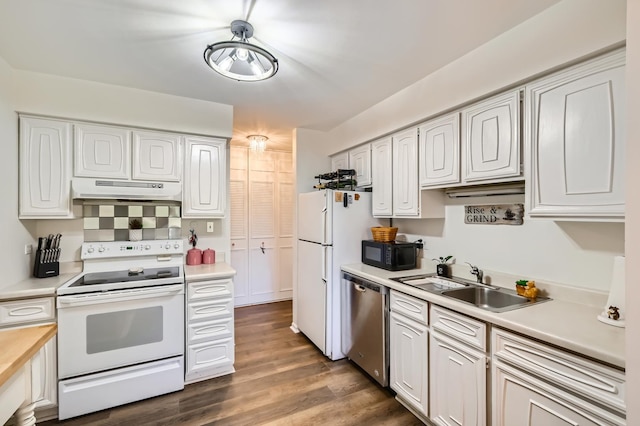 455 Raintree Ct Unit 1C, Glen Ellyn, IL 60137 - kitchen with white appliances, under cabinet range hood, light countertops, and white cabinetry