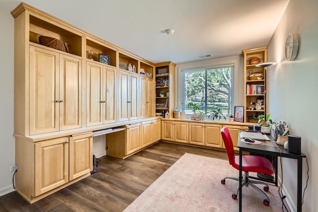 455 Raintree Ct Unit 1C, Glen Ellyn, IL 60137 - home office featuring dark wood-style floors, built in desk, and built in features