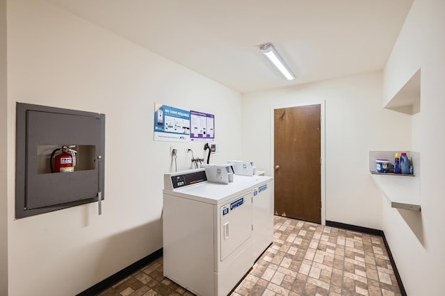 455 Raintree Ct Unit 1C, Glen Ellyn, IL 60137 - community laundry room featuring washer and dryer and brick patterned floors