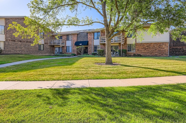 455 Raintree Ct Unit 1C, Glen Ellyn, IL 60137 - view of property with a front lawn and brick siding