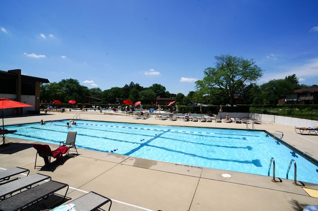 455 Raintree Ct Unit 1C, Glen Ellyn, IL 60137 - community pool featuring a patio area