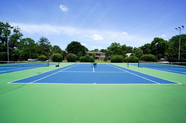 455 Raintree Ct Unit 1C, Glen Ellyn, IL 60137 - view of tennis court featuring community basketball court