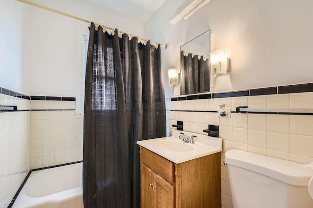 4017 Park Ave, Brookfield, IL 60513 - bathroom featuring tile walls, vanity, a wainscoted wall, and shower / tub combo with curtain