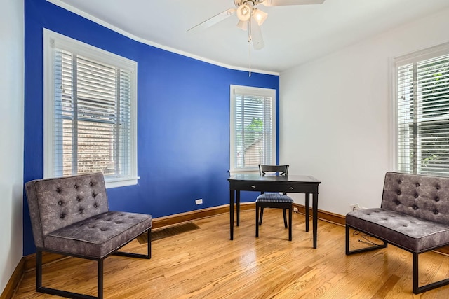 4017 Park Ave, Brookfield, IL 60513 - living area featuring plenty of natural light, light wood-style flooring, ceiling fan, and ornamental molding