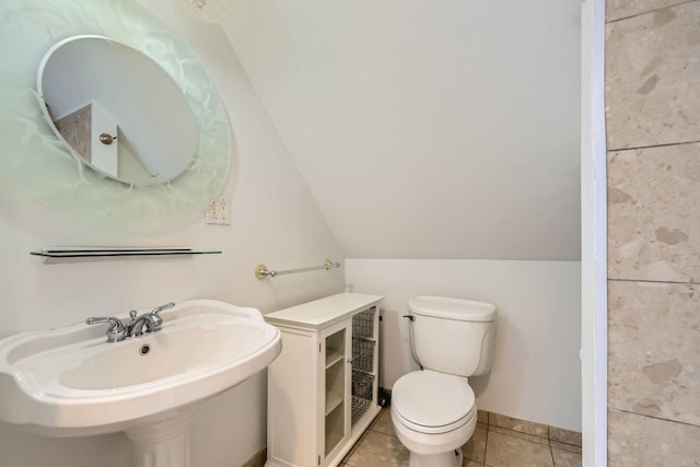 4017 Park Ave, Brookfield, IL 60513 - bathroom with vaulted ceiling and tile patterned flooring