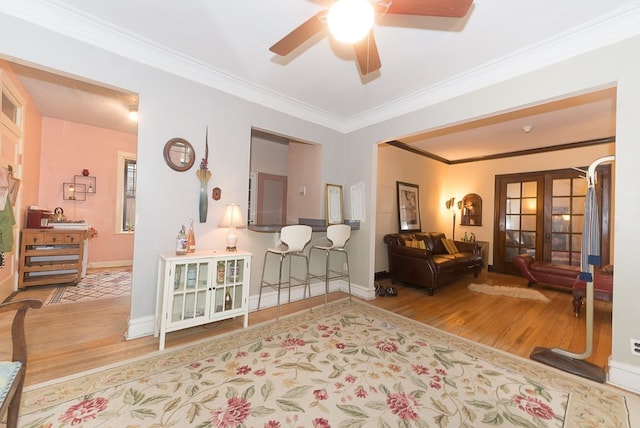 508 Madison St Unit 2S, Oak Park, IL 60302 - sitting room featuring wood finished floors, french doors, crown molding, and a ceiling fan