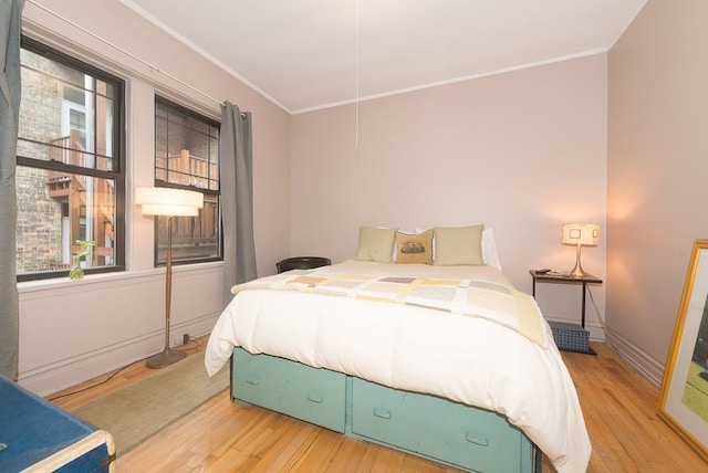 508 Madison St Unit 2S, Oak Park, IL 60302 - bedroom featuring light wood finished floors and crown molding