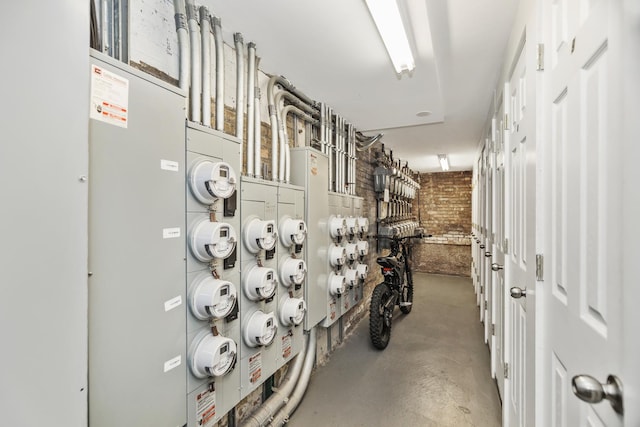 5656 N Kimball Ave Unit Gs, Chicago, IL 60659 - hallway with concrete floors and brick wall