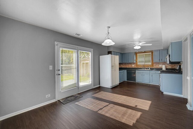 706 Shining Water Dr, Carol Stream, IL 60188 - kitchen with white refrigerator with ice dispenser, ceiling fan, dark countertops, blue cabinetry, and dark wood-type flooring