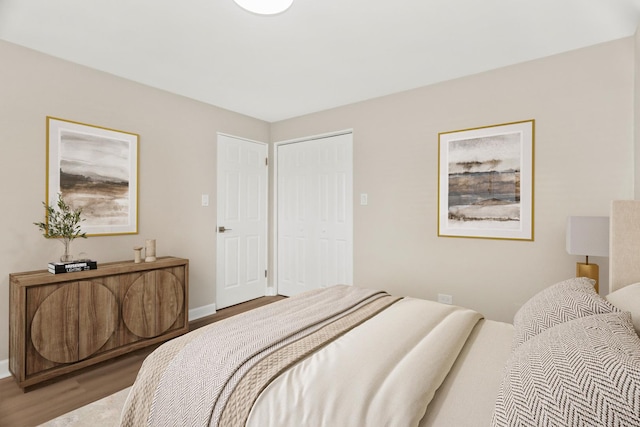 6432 N Ridge Ave Unit 3I, Chicago, IL 60626 - bedroom with wood finished floors and a closet