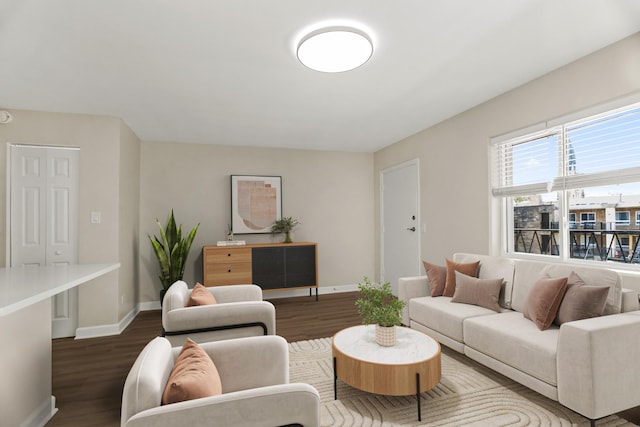 6432 N Ridge Ave Unit 3I, Chicago, IL 60626 - living room with dark wood-style floors and baseboards