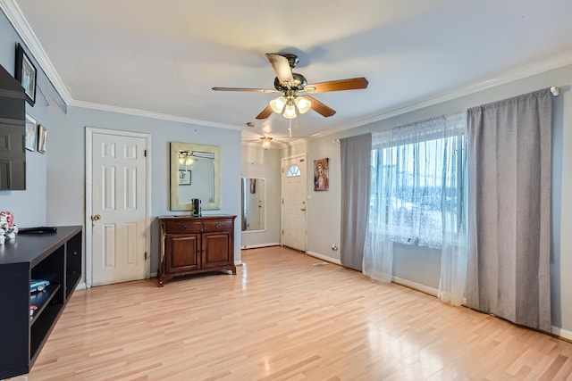 1142 N Boxwood Dr Unit B, Mount Prospect, IL 60056 - entryway featuring ceiling fan, crown molding, and light wood-style flooring