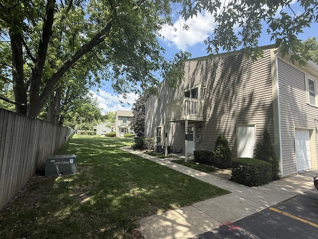 1690 Ashburn Ct Unit A, Wheaton, IL 60189 - view of side of property featuring a balcony and a garage