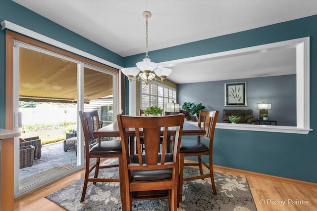 2370 Nantucket Ln, Elgin, IL 60123 - dining area with a chandelier and light wood-type flooring