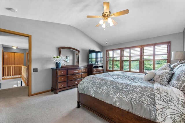 2370 Nantucket Ln, Elgin, IL 60123 - bedroom featuring vaulted ceiling, multiple windows, light carpet, and a ceiling fan