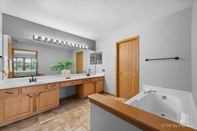 2370 Nantucket Ln, Elgin, IL 60123 - bathroom featuring a bath, double vanity, and ensuite bath
