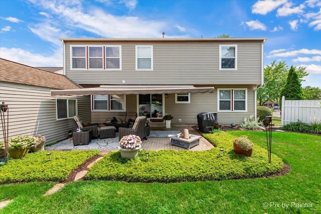 2370 Nantucket Ln, Elgin, IL 60123 - back of property with an outdoor living space with a fire pit and a patio area