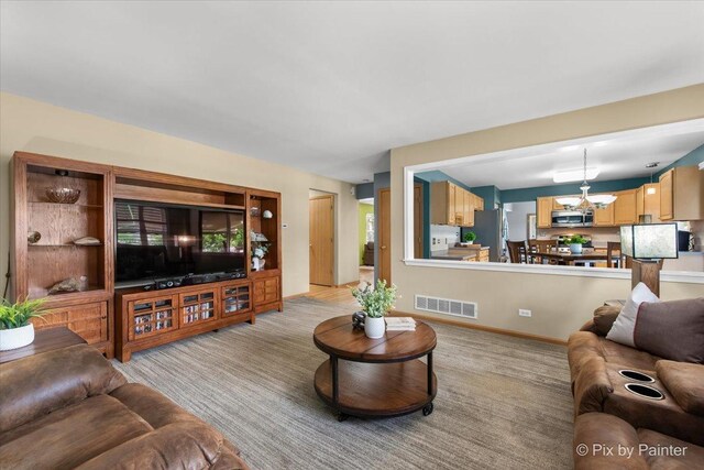 2370 Nantucket Ln, Elgin, IL 60123 - living room with a chandelier
