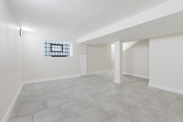 7111 S Michigan Ave, Chicago, IL 60619 - below grade area featuring baseboards