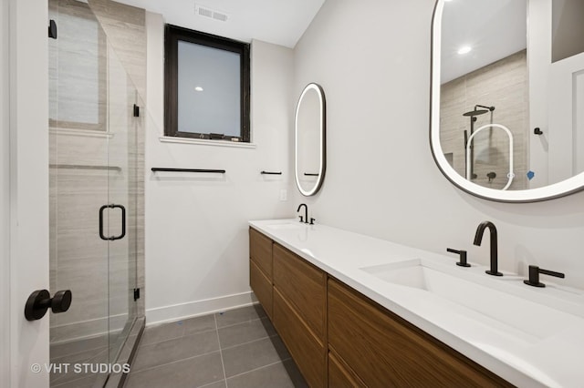 220 S Oakley Blvd, Chicago, IL 60612 - bathroom featuring double vanity, a stall shower, and tile patterned flooring