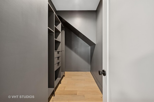 220 S Oakley Blvd, Chicago, IL 60612 - walk in closet with light wood-style flooring