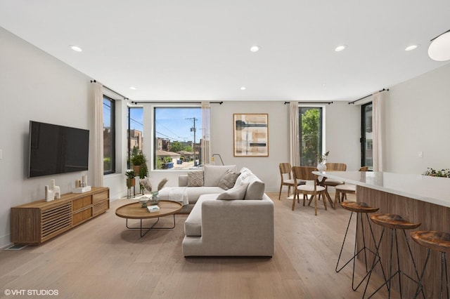 220 S Oakley Blvd, Chicago, IL 60612 - living area with light wood-type flooring and recessed lighting