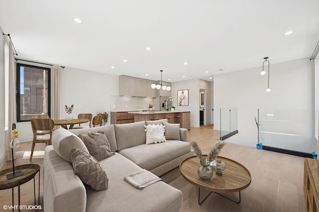 220 S Oakley Blvd, Chicago, IL 60612 - living area featuring light wood-style floors and recessed lighting