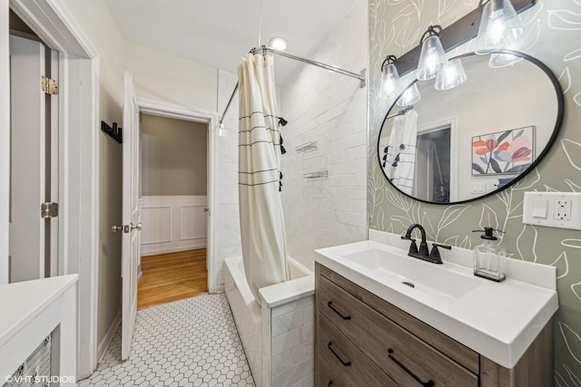 427 S Taylor Ave Unit 2N, Oak Park, IL 60304 - bathroom featuring vanity, shower / bath combo, wallpapered walls, and wainscoting