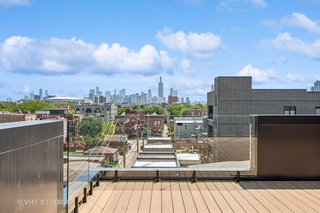 222 S Oakley Blvd Unit 3, Chicago, IL 60612 - wooden deck with a skyline view