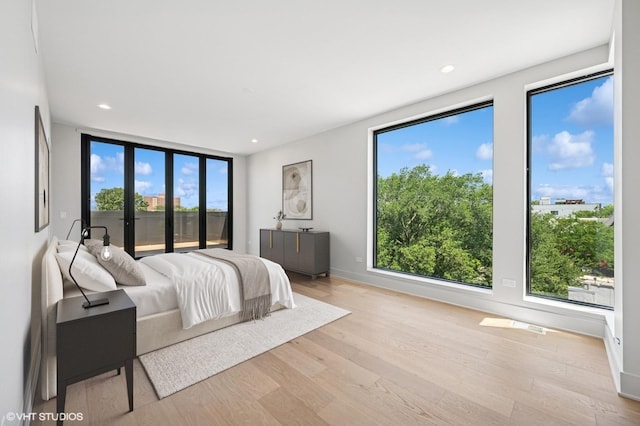 222 S Oakley Blvd Unit 3, Chicago, IL 60612 - bedroom featuring wood finished floors and recessed lighting