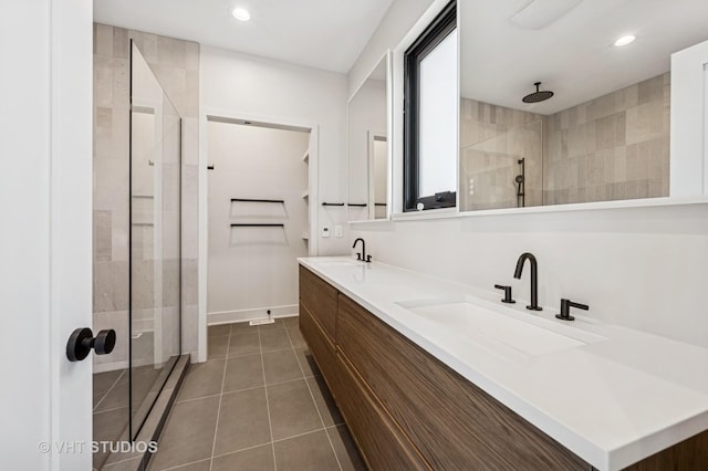 222 S Oakley Blvd Unit 3, Chicago, IL 60612 - full bath with a shower stall, double vanity, tile patterned floors, and recessed lighting